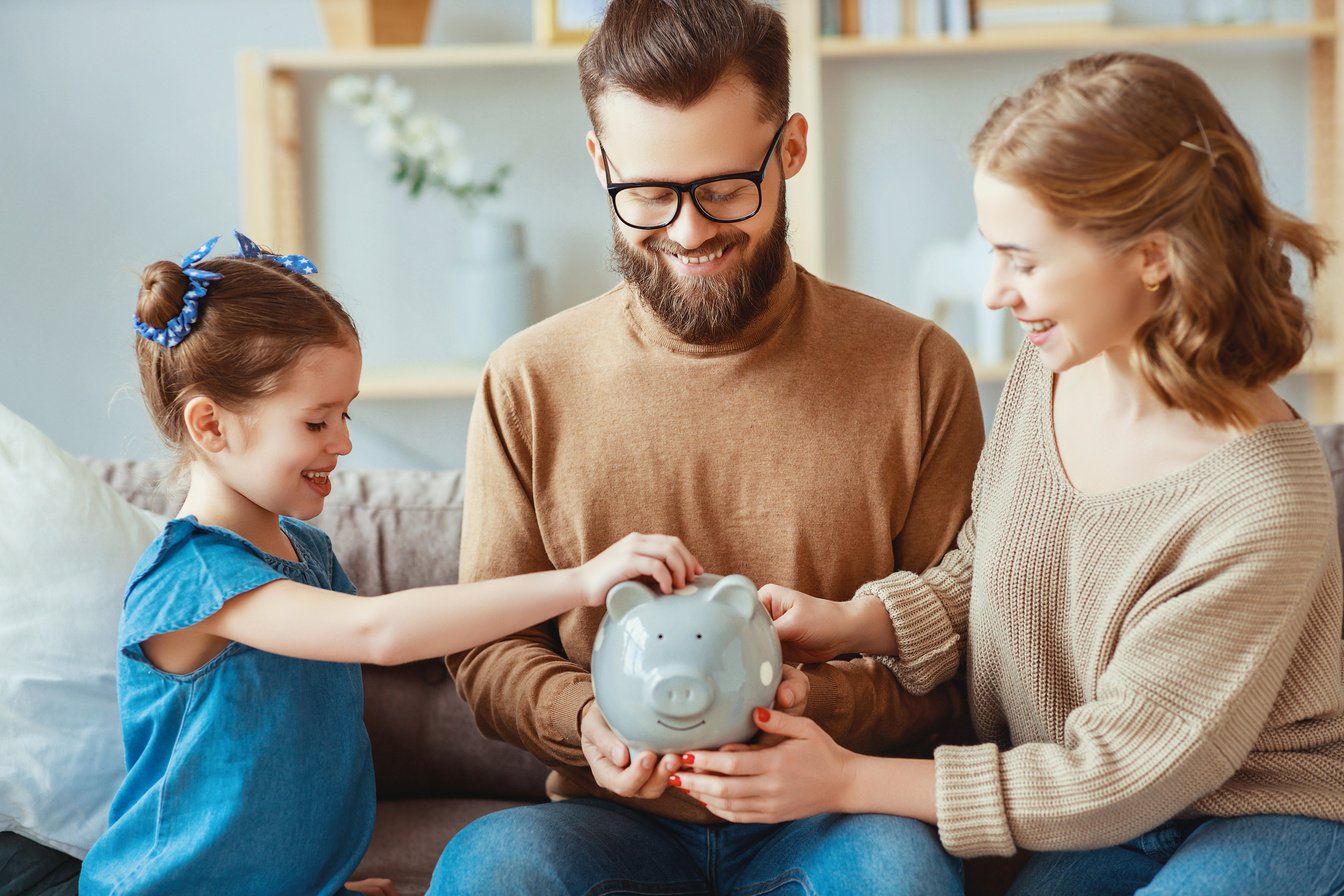 family savings, budget planning, children's pocket money. family with piggy Bank